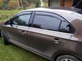 Дефлекторы окон (ветровики) Renault Logan (Рено Логан) 2004-2014 клеятся на скотче ANV